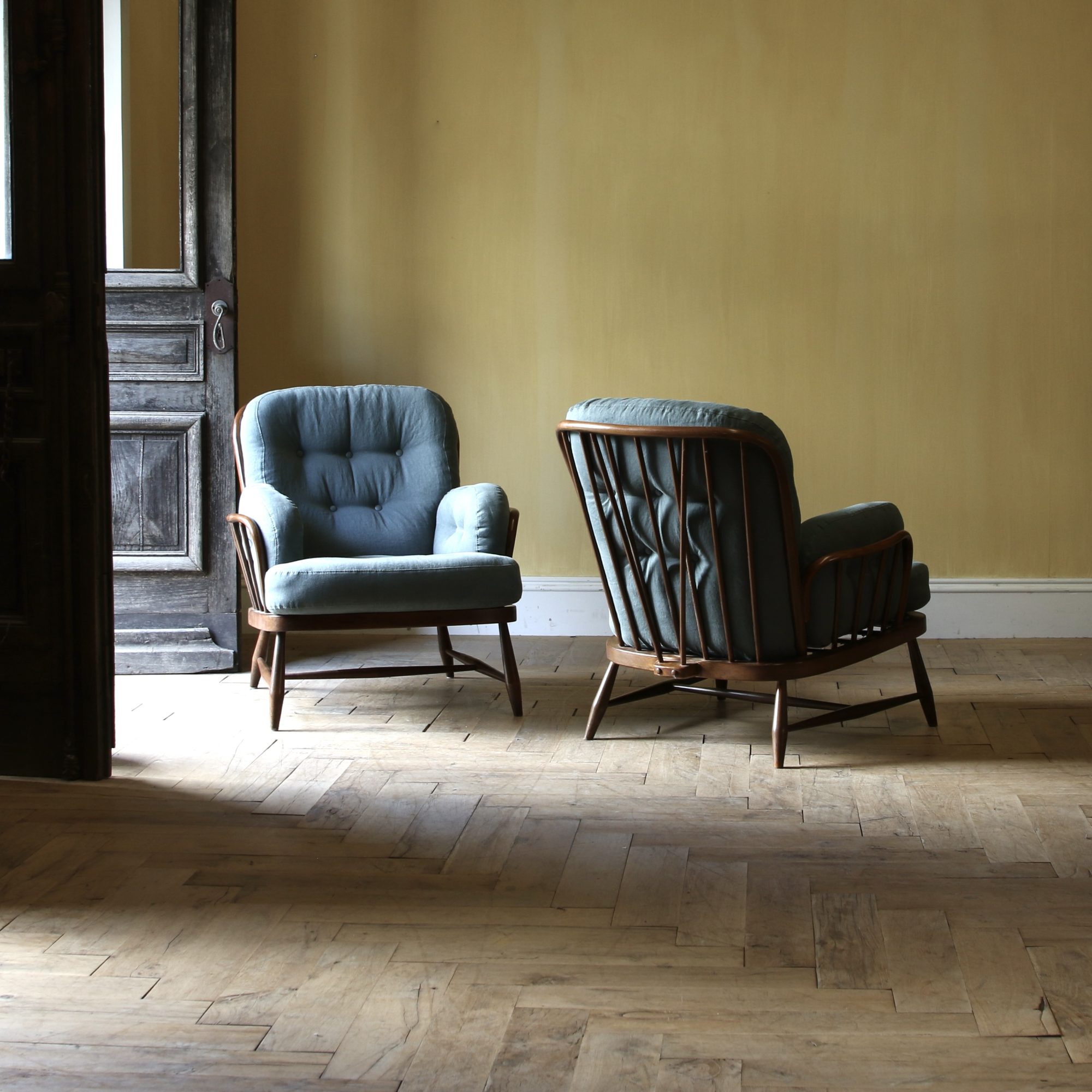 156-38 - Ercol Jubilee Armchairs 